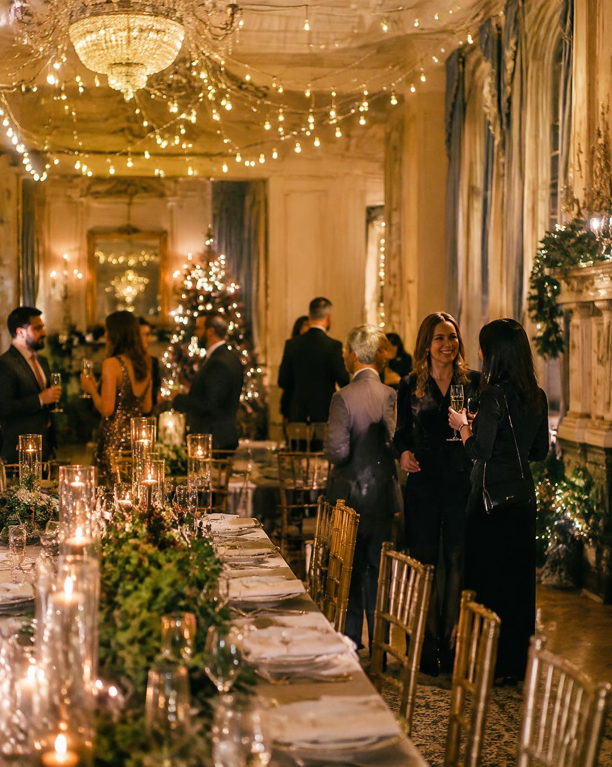 Grand dining room lit for a holiday party